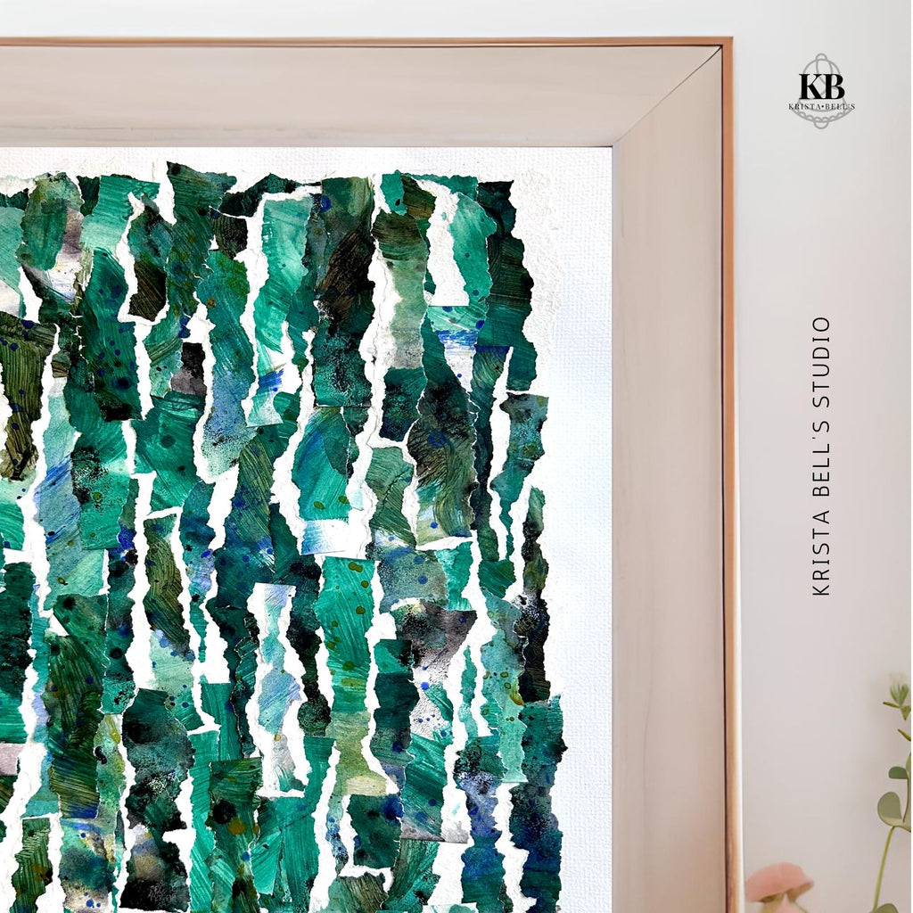 Framed abstract artwork with green and blue patterns on a white background, featuring the brand 'KB'.