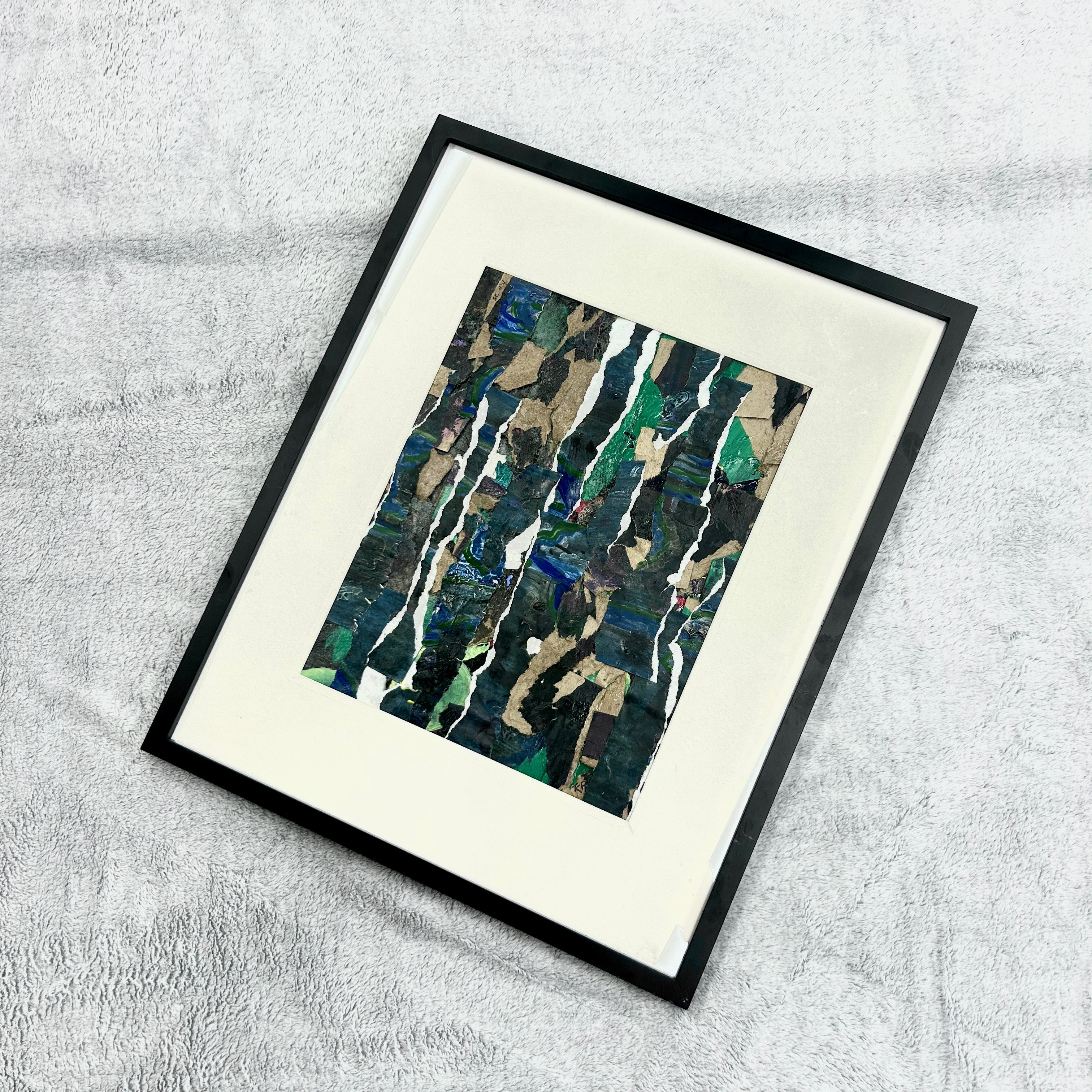Framed abstract artwork on a textured surface. Representing growth and stability forged in tough times.