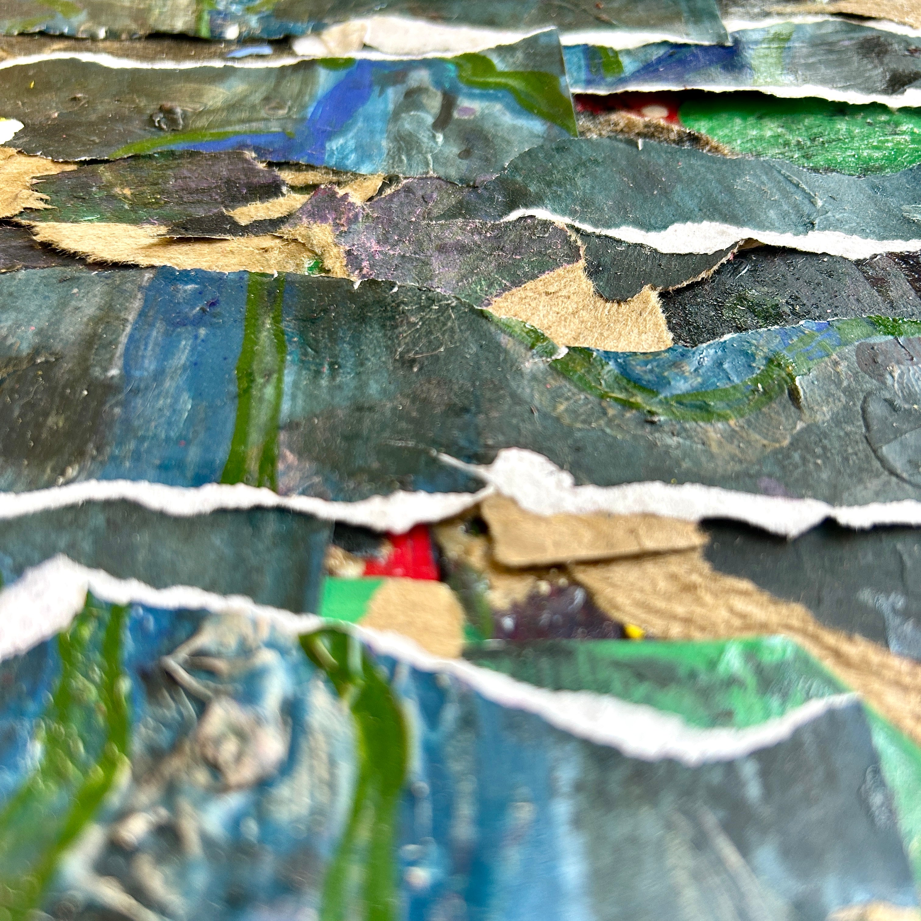 Collage of torn paper with various colors and textures. Representing growth and stability forged in tough times.