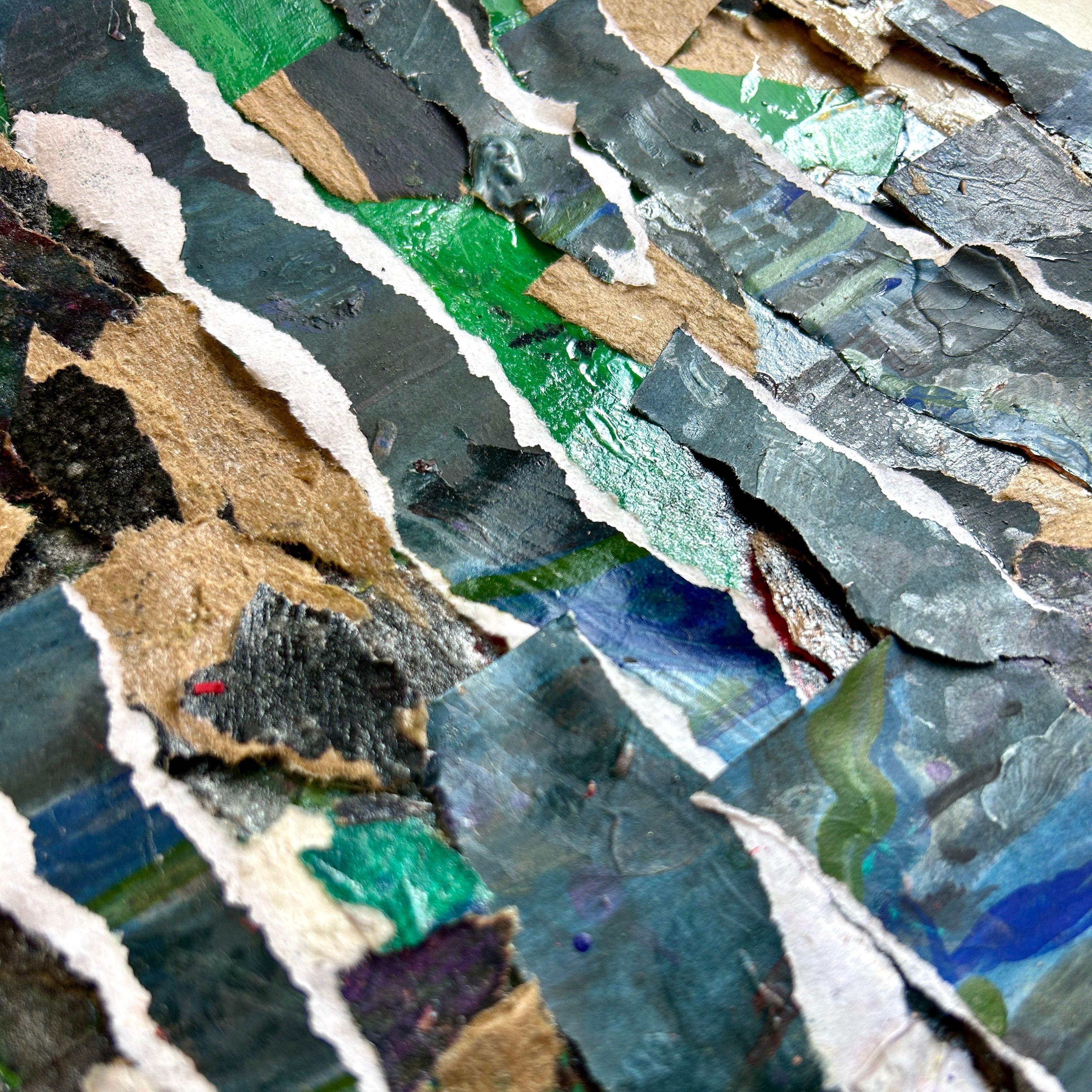 Close-up of a mosaic made from various colored tiles. Representing growth and stability forged in tough times.