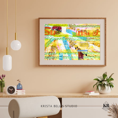 Colorful abstract artwork in a wooden frame on a beige wall with decorative elements below. A yellow and teal artwork reflecting on the joy found in life when you thoughts, actions, and emotions align with your values. 