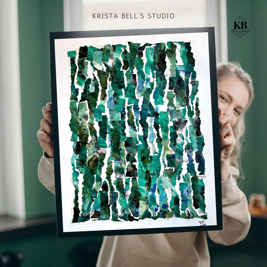 Person holding a framed abstract art piece with green patterns, branded 'Krista Bell's Studio', representing the growth you have as person after a period of rest.