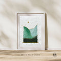 Framed abstract art piece on a wall with 'Krista Bell's Studio' branding.