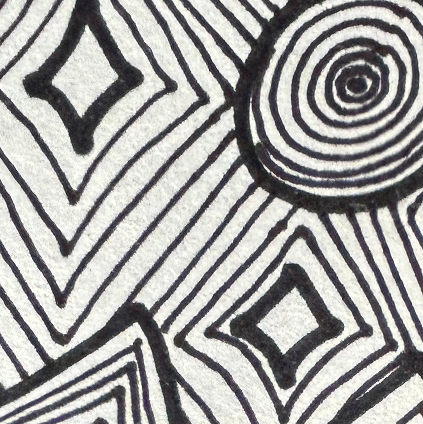 Close-up of black geometric patterns on a white background