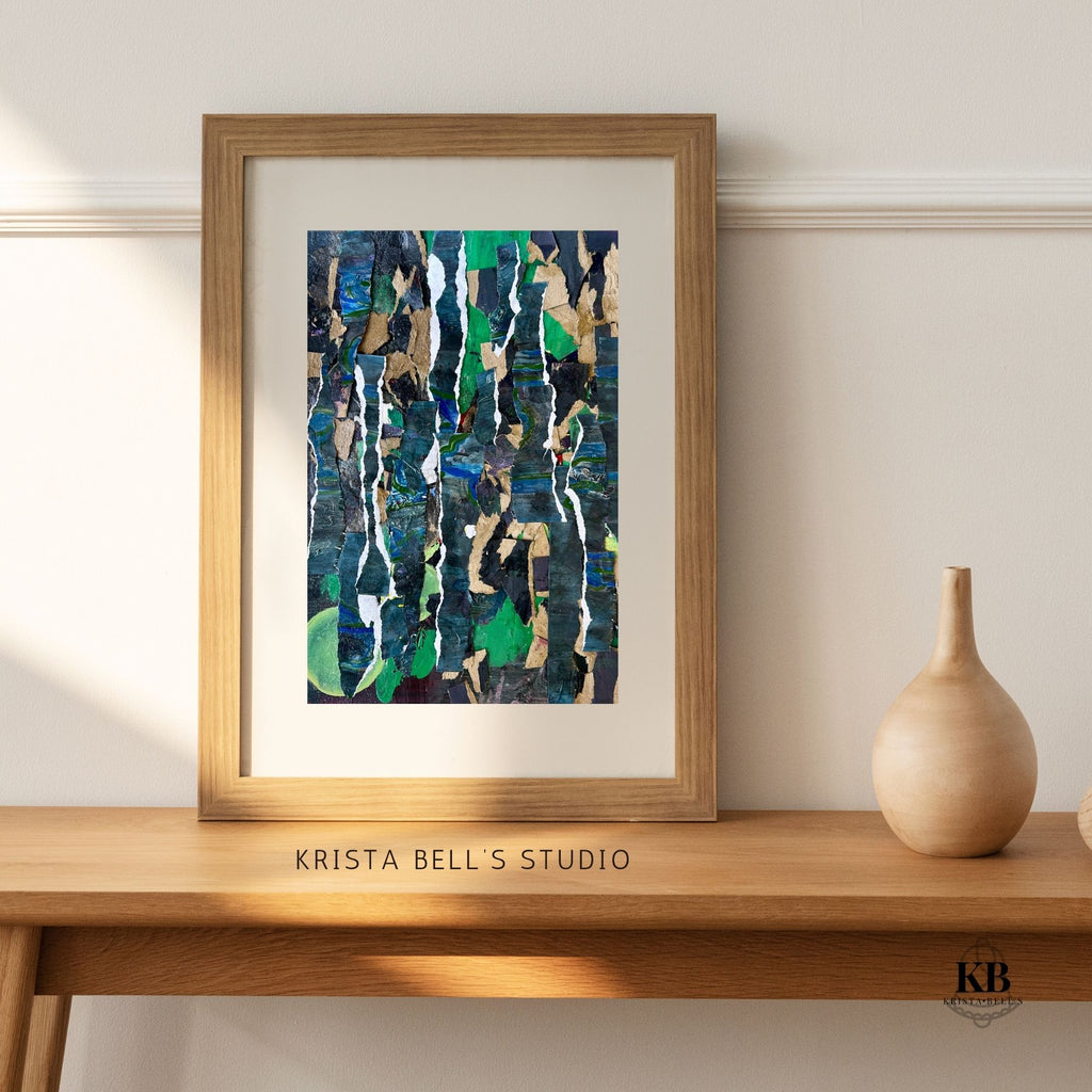 Framed abstract art on a wooden shelf with a vase, featuring 'Krista Bell's Studio' branding. Representing growth and stability forged in tough times.