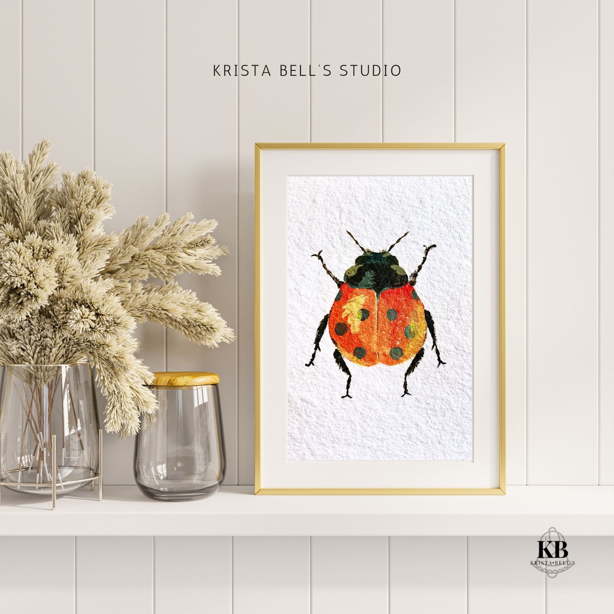 Framed artwork of a ladybug on a textured white background with decorative elements.