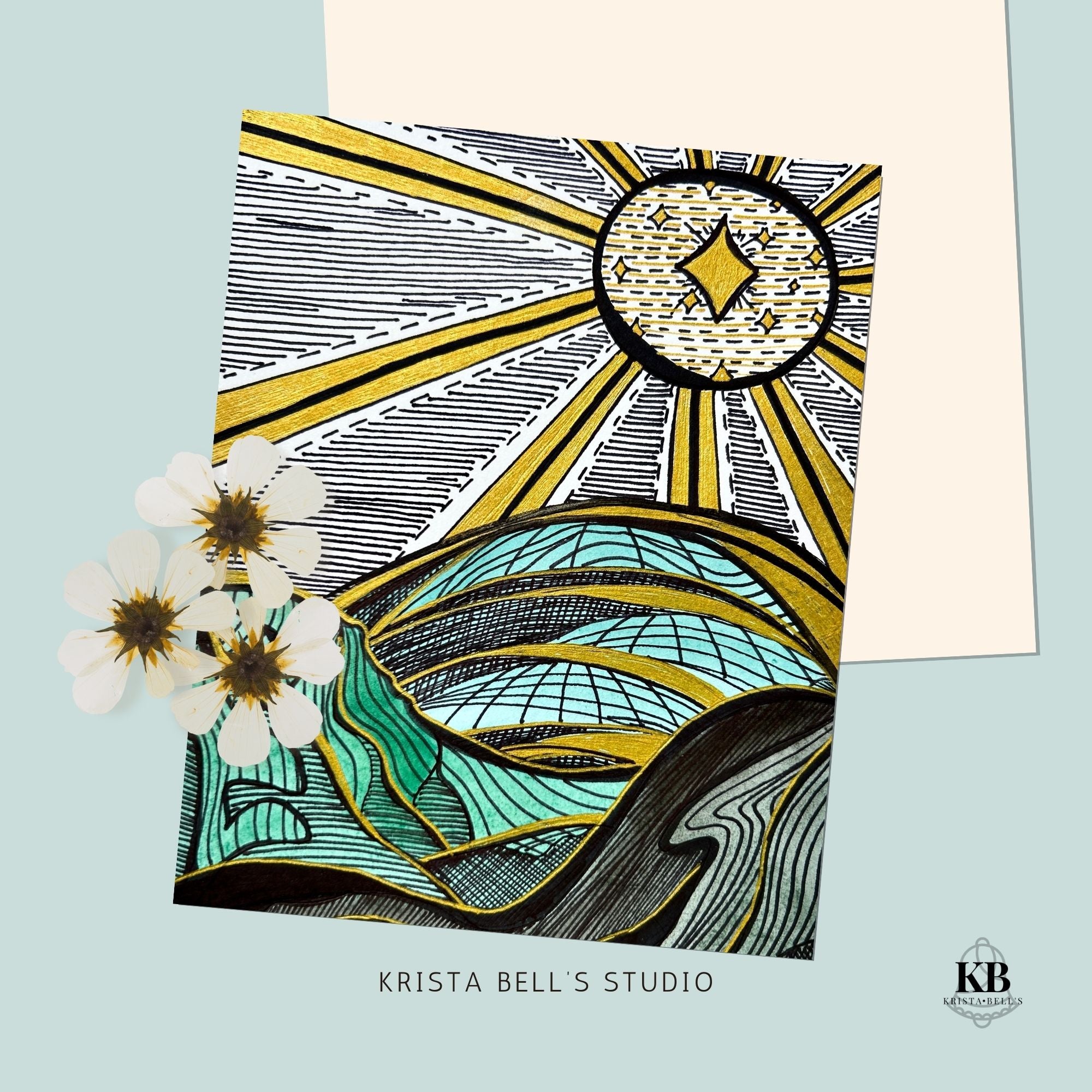 Artistic design with sun and floral elements on a light blue background, featuring 'Krista Bell's Studio' branding.