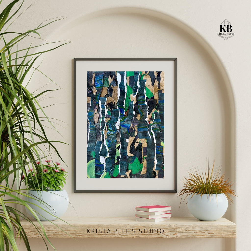 Framed abstract art piece on a wall with plants and books below, featuring the brand 'Krista Bell's Studio'. Representing growth and stability forged in tough times.