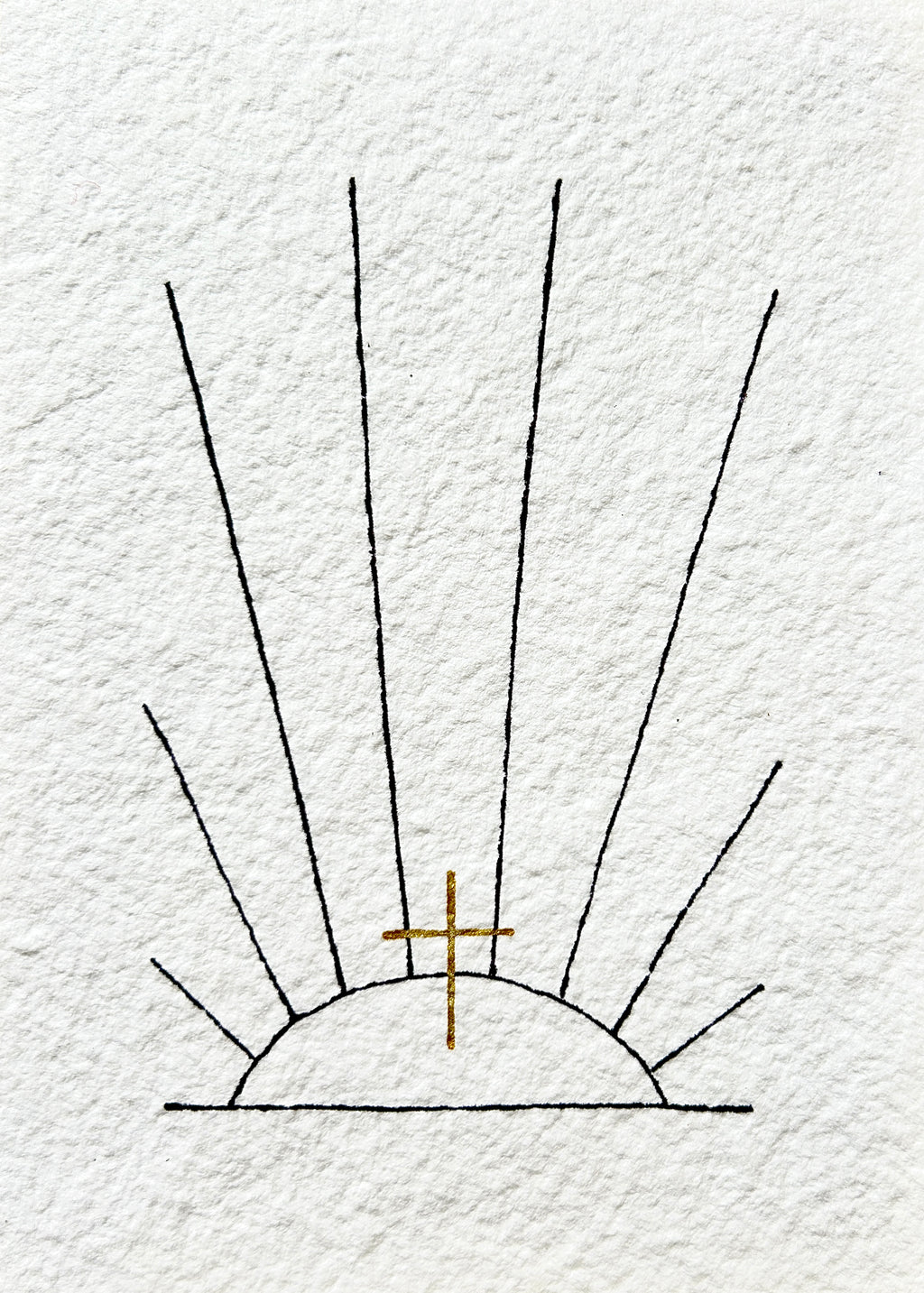 Simplified drawing of a sun with rays and a cross on a textured white background