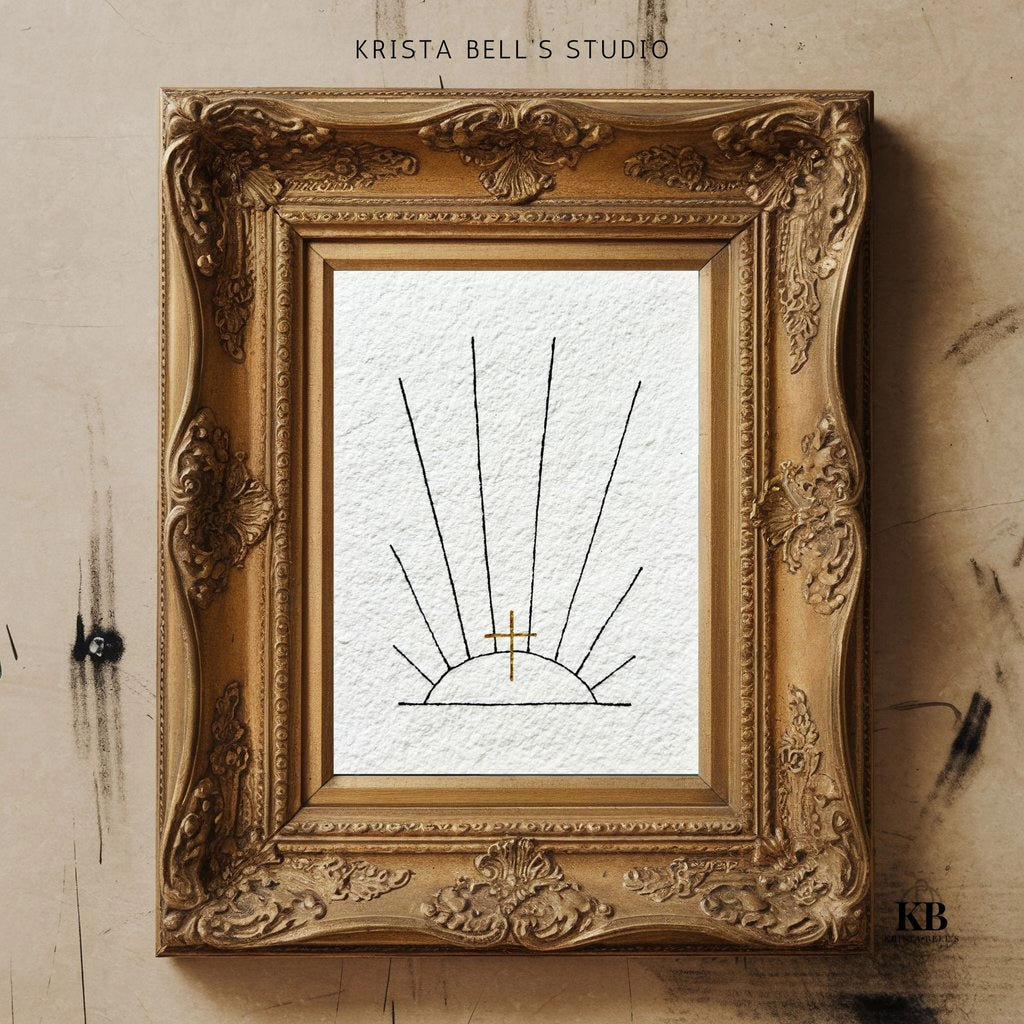Decorative gold frame with intricate designs containing a black and white sunrays and a golden cross on textured paper.