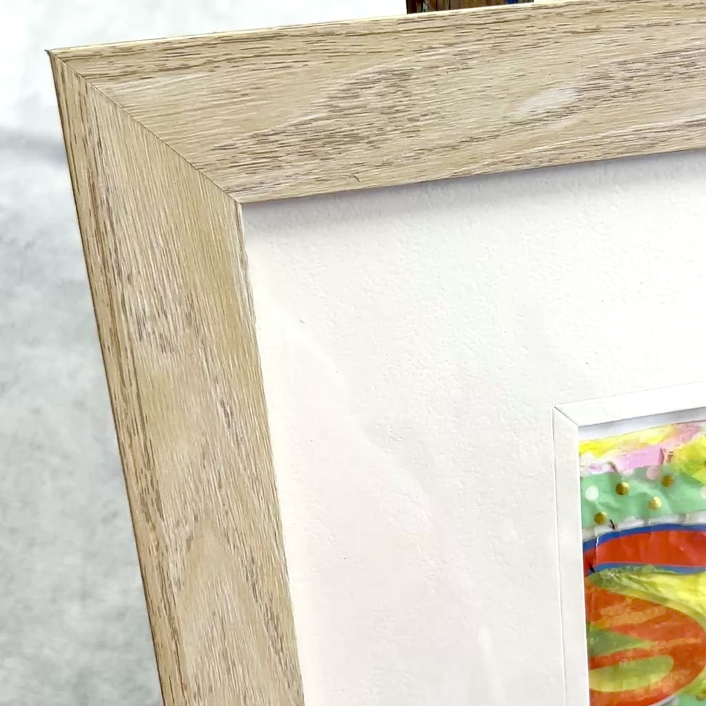 A short video panning across a vibrant abstract collage. A yellow and teal mixed media collage reflecting on the joy found in life when you thoughts, actions, and emotions align with your values. 