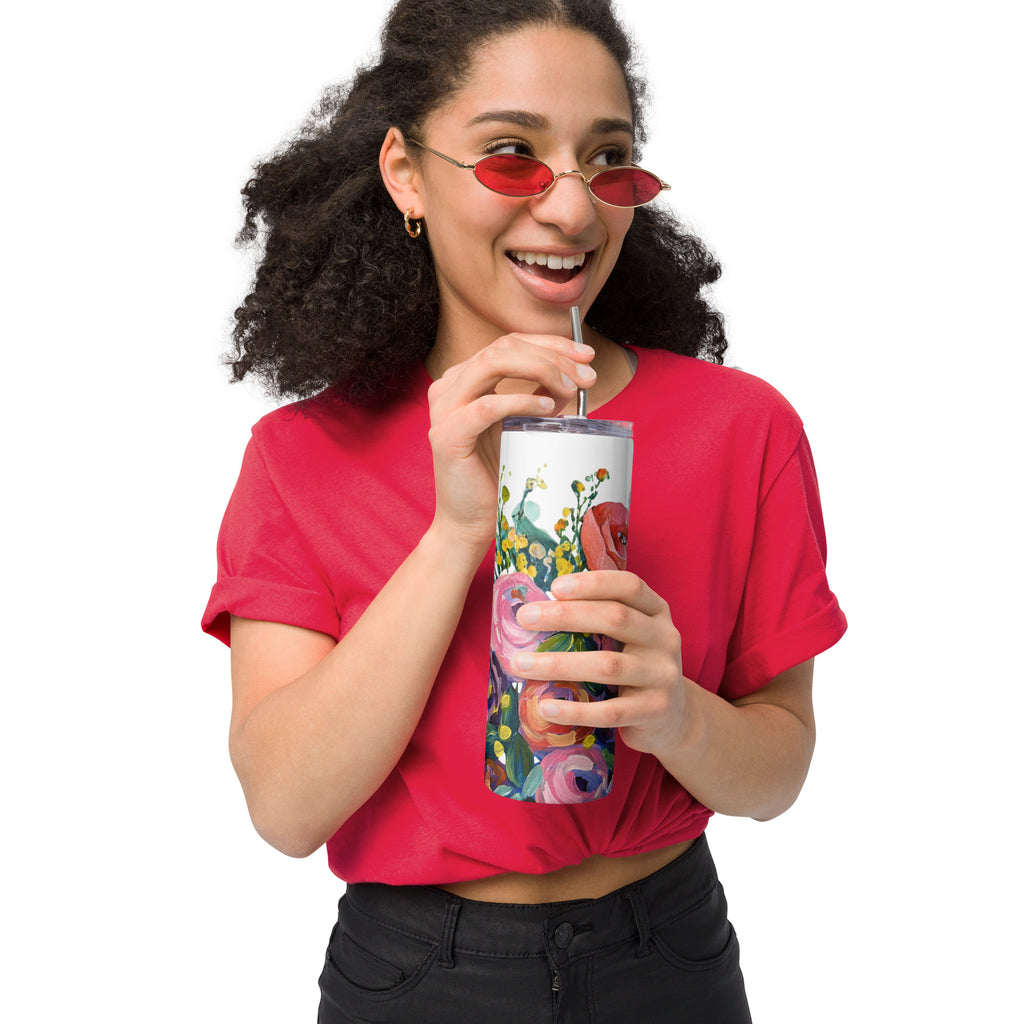 Product mockup of a 20oz stainless steel water tall tumbler, with painted flowers on it.